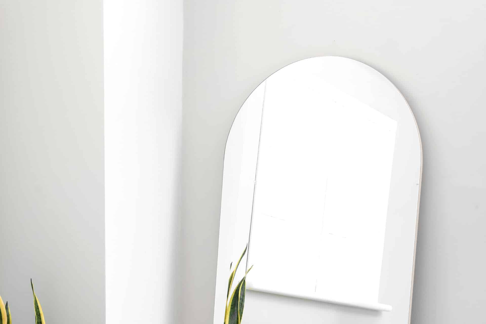 arched bathroom mirror