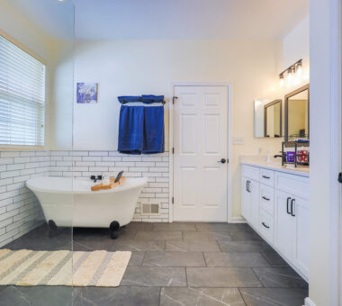 Spacious white bathroom in Round Hill, VA featuring a clean, minimalist design with a relaxing and inviting atmosphere.