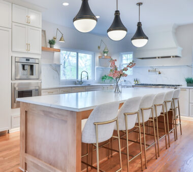 Spacious New Market kitchen remodel with clean white design and large countertop.