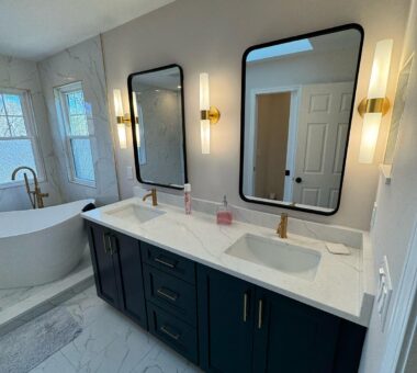 Modern bathroom with clean white tiles and black fixtures